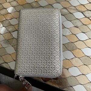 Tory Burch Silver zippered cell phone case and wallet T logo